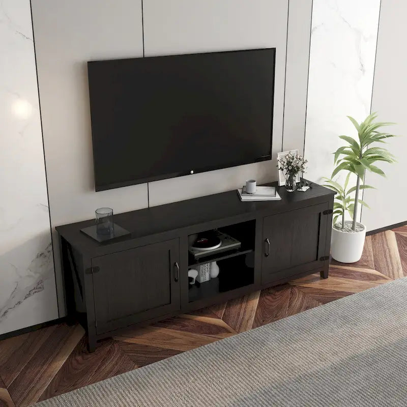 Meuble TV en bois noir avec étagères ouvertes et portes de placard