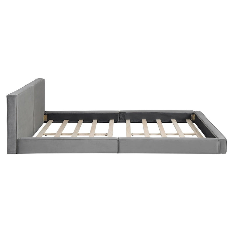 Lit queen-size plateforme en velours gris avec tête de lit rembourrée et profil bas
