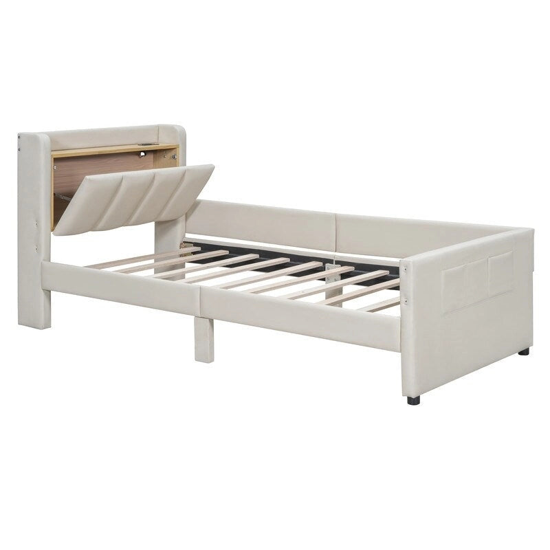 Lit plateforme capitonné beige avec tiroirs de rangement et étagères de tête de lit