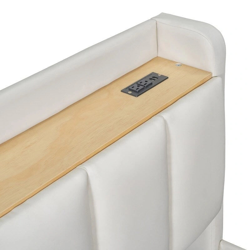 Lit plateforme capitonné beige avec tiroirs de rangement et étagères de tête de lit